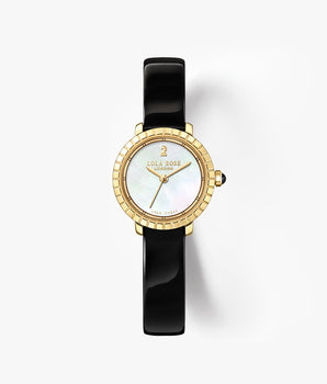 A luxury watch by Lola Rose, featuring a glossy black strap, a gold bezel, and a white mother-of-pearl dial with gold hands and indices, set against a clean white background.